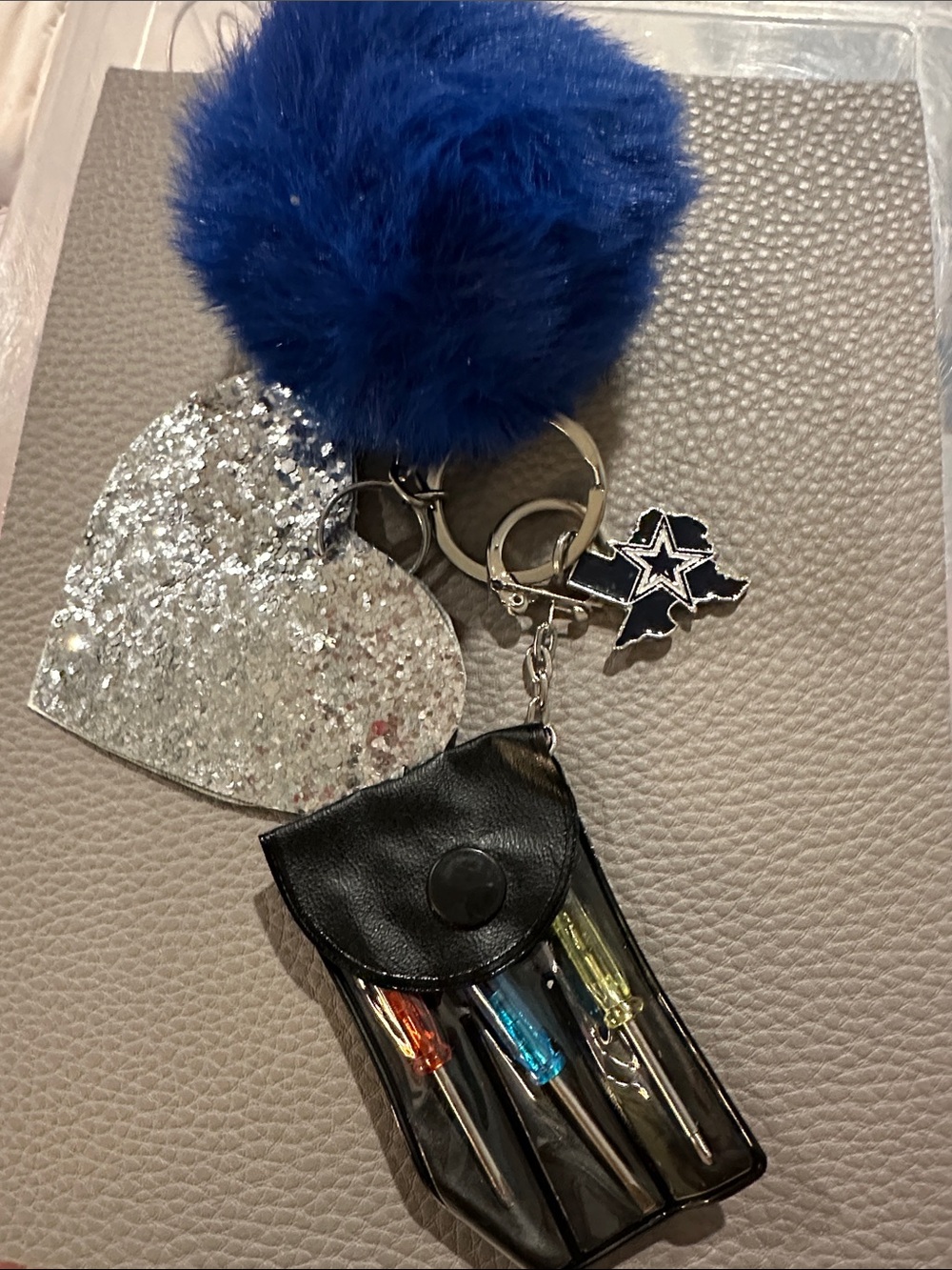 Blue Pom-Pom Keychain with Silver Heart and Black Tool Pouch